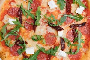 Mixed pizza from top isolated on white background clipping path included. photo