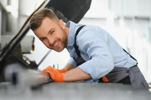 Factory worker. Man working on the production line. photo