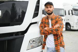 Portrait of confident truck driver on parking lot looking at camera. Copy space photo