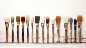 Minimalist Paintbrushes on a white background photo