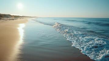 Sandy Beach Shoreline With Foamy Waves at Sunrise photo