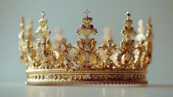Exquisite Golden Crown Adorned With Intricate Designs and Glimmering Gems on a White Background. photo