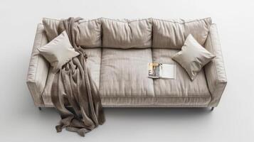 Cozy Living Room Corner With Soft Couch, Warm Blankets, and Relaxing Reading Space in a Contemporary Home. photo