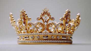 Exquisite Golden Crown Adorned With Intricate Designs and Sparkling Gems Against a Pure White Background. photo