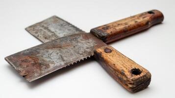 Artisan-Used Vintage Meat Cleaver With Worn Wooden Handle Surrounded by Rustic Kitchen Setting. photo