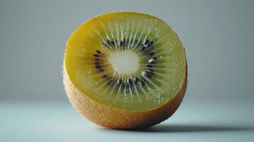 Sliced Kiwi Fruit Displaying Vibrant Green Flesh and Unique Seed Pattern, Isolated on White Background. photo