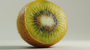 Freshly Sliced Kiwi Exposing Juicy Interior With Water Droplets on Light Background. photo