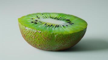 Fresh Green Kiwi Fruit Halved Displaying Juicy Flesh and Tiny Black Seeds on White Background. photo