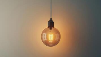 Elegant Vintage Edison Bulb Hanging From a Black Pendant Light Fixture in a Modern Interior Setting. photo