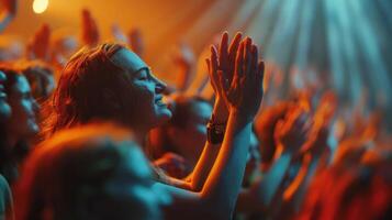 Joyful Audience Engaging in Uplifting Music Performance Under Colorful Lights photo