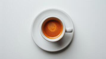 A Warm Cup of Espresso on a White Tabletop in a Cozy Cafe at Dawn photo