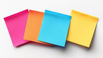 Vibrant, Colorful Sticky Notes Arranged Creatively on a Minimalist White Surface photo