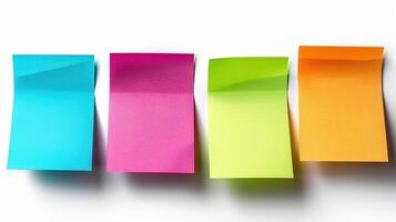 Colorful Sticky Notes Displayed in Bright Light on a White Surface During a Creative Brainstorming Session photo