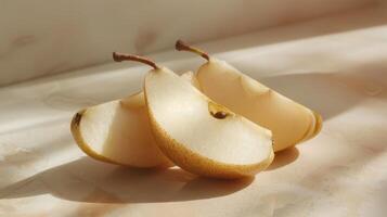 Delicate Slices of Juicy Pears Glowing in Soft Morning Light on Kitchen Counter photo