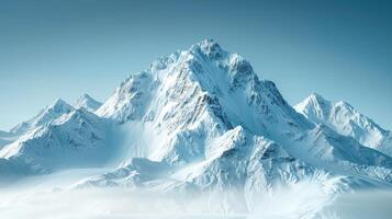 Majestic Snow-Capped Peaks Under Clear Blue Sky at Dawn in Winter Wonderland photo