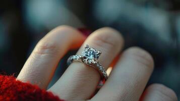 Sparkling Diamond Engagement Ring Captured on a Hand During Autumn Sunset photo