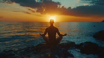 Serene Meditation at Sunset on Tranquil Ocean Shoreline With Gentle Waves and Vibrant Colors photo