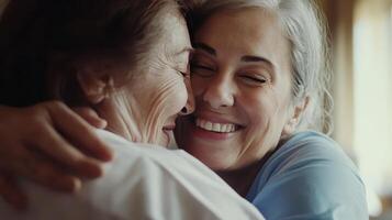 Two women share a joyful, heartfelt embrace filled with love and warmth photo