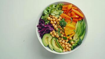 Colorful Bowl of Fresh Vegetables and Chickpeas Prepared in a Bright Kitchen During Daylight photo