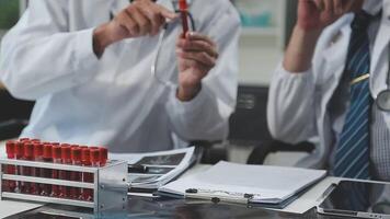 Doctors in office working on medical report video