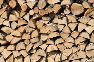 Chopped firewood on a stack photo
