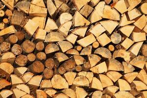 Chopped firewood on a stack photo