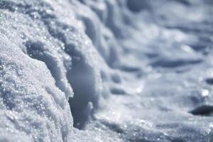 Detail of winter nature in countryside. Melting snow surface. photo