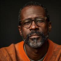Confident African American Man Wearing Glasses Against Solid Background photo
