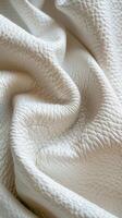 Textured White Leather Material Draped Elegantly on a Surface photo