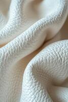 Soft White Leather Material Draped Elegantly on a Surface photo