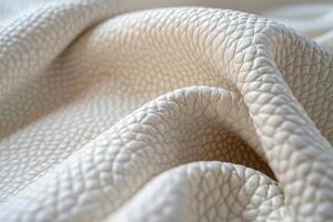 Textured White Leather Material Draped Elegantly on a Surface photo