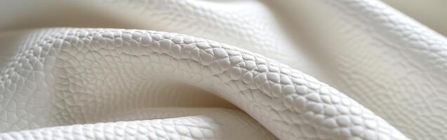 Soft White Leather Material Draped Elegantly Over Surface photo