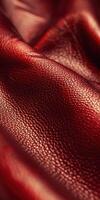 Rich Red Leather Material Draped Elegantly on Soft Surface photo