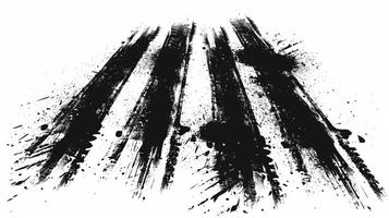 Grunge edged black tire tracks on a white surface photo