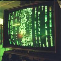 Green phosphor monitor displaying source code from the 80s photo