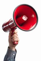 Man holding a red and silver megaphone on white background photo