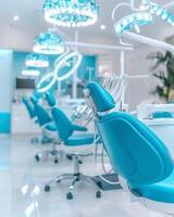 Modern dental office showing empty blue dentist chairs waiting for patients photo