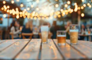 Outdoor Pub Gathering at Golden Hour With Beer Glasses and Warm String Lights photo