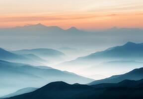 Serene Mountain Range at Dusk Overlooking Layered Blue Haze photo