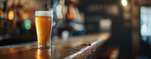Craft Beer Glass on Bar Counter in Warmly Lit Brewery at Sunset photo