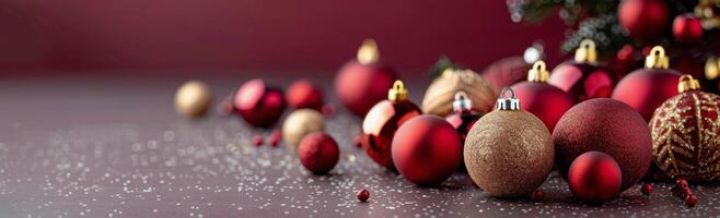 Colorful Christmas Ornaments on a Burgundy Background photo