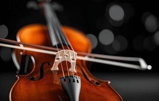Close-Up of a Vibrant Violin Against a Dark Background photo