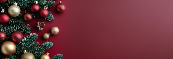 Elegant Christmas Decorations With Ornaments and Pine Cones on Red Background photo