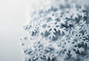White Snowflakes and Beads on Soft Blue Background for Winter Decor photo
