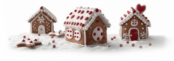 Decorated Gingerbread Houses With Colorful Candy on a Snowy Surface photo