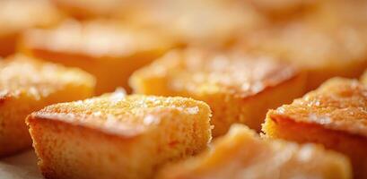 Freshly Baked Sweet Vanilla Cake Cubes On A White Surface photo