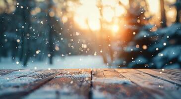 Snowflakes Falling Gently Over a Wooden Surface at Sunset in a Winter Forest photo