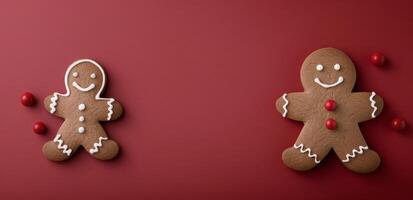 Gingerbread Cookies With Decorations on Red Background photo