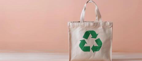 Reusable Shopping Bag With Green Recycling Symbol at a Natural Setting photo