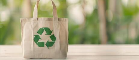 Reusable Shopping Bag With Green Recycling Symbol at a Natural Setting photo